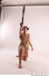 ANISE KNEELING POSE WITH AX 